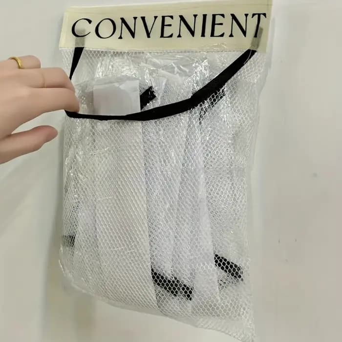 1 grand sac de rangement mural en maille
