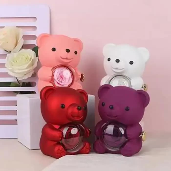 Boîte à bijoux rotative en plastique en forme d'ours