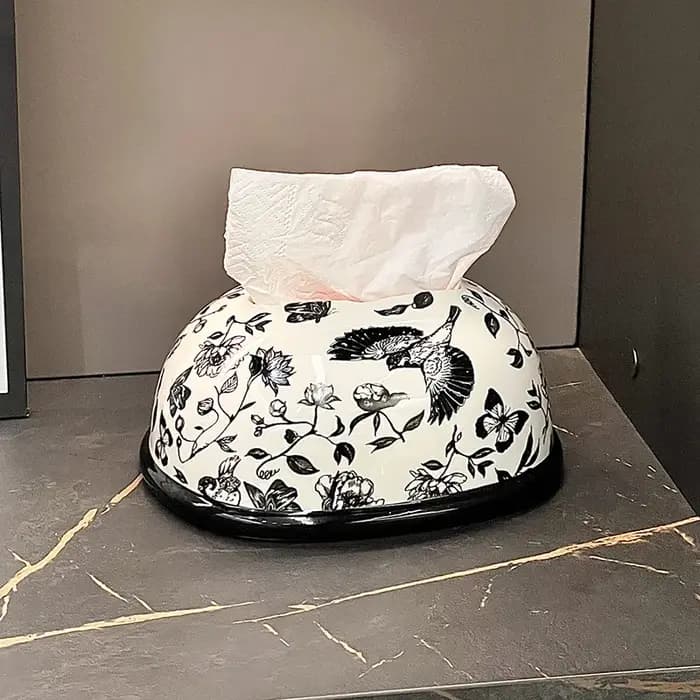 Boîte à mouchoirs en céramique avec cadeau à la main