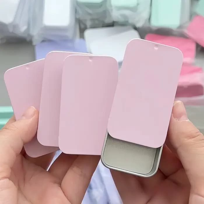 Petite boîte en fer à couvercle coulissant couleur Macaron
