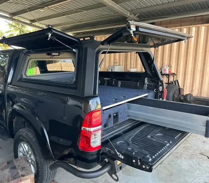 Système de rangement pour coffre de voiture