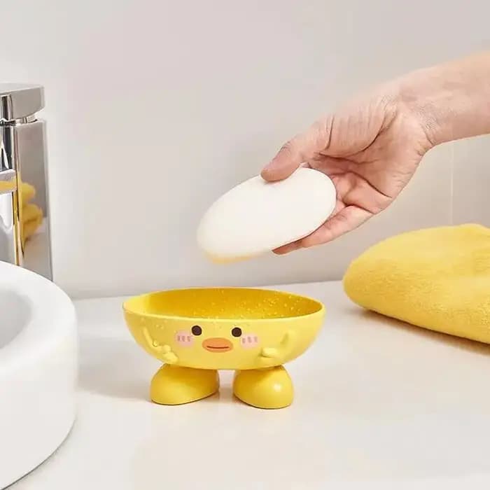 Porte-savon avec vidange en forme de canard