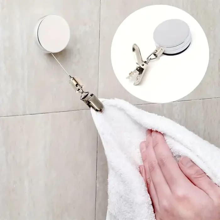 Porte-serviettes rétractable automatique