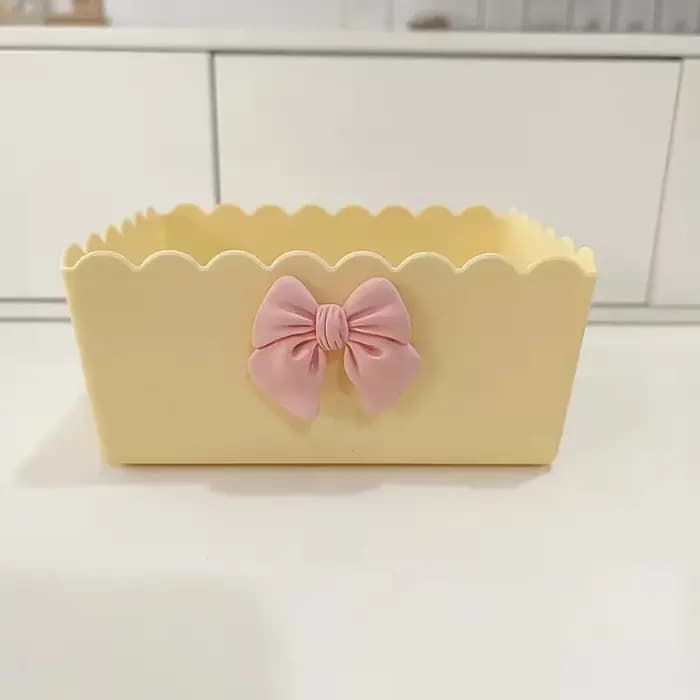Boîte de rangement de bureau en plastique jaune avec nœud