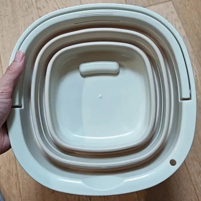 Seau pliable avec poignée pour un rangement facile, idéal pour la pêche, le camping, les voyages et diverses utilisations en extérieur
