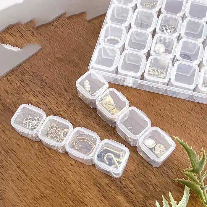 Boîte de rangement compacte en PP 56/28Grid, idéale pour ranger les perles, les outils à ongles et les contenants de rangement en plastique vides.