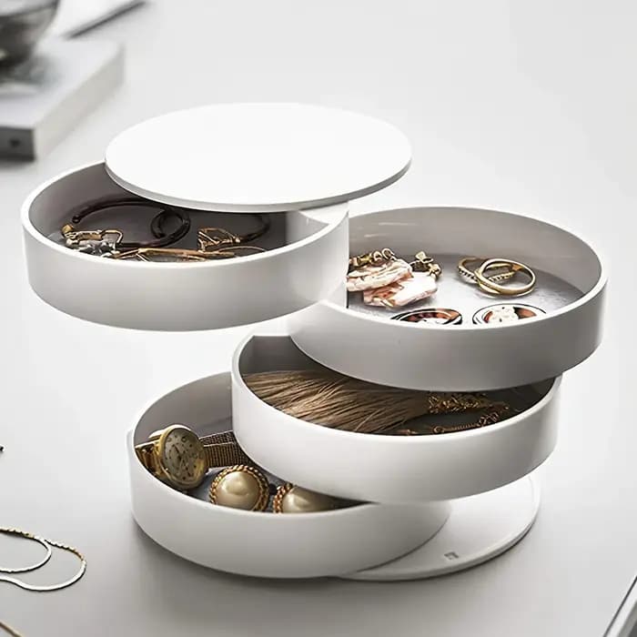 Boîte de rangement de bureau rotative multicouche pour accessoires capillaires