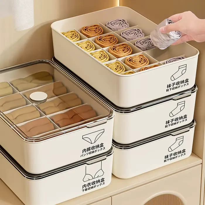 La nouvelle boîte de rangement pour sous-vêtements est un organisateur de vêtements intimes trois en un pour un usage domestique