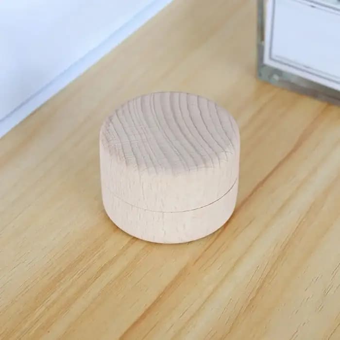 Petite boîte de rangement ronde en bois pour bijoux faits à la main