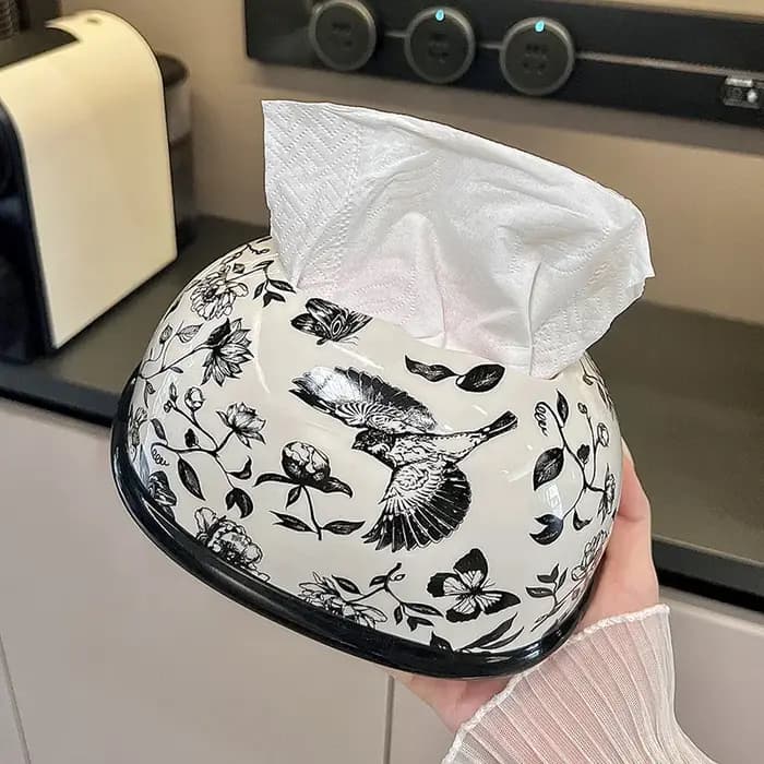 Boîte à mouchoirs en céramique avec cadeau à la main