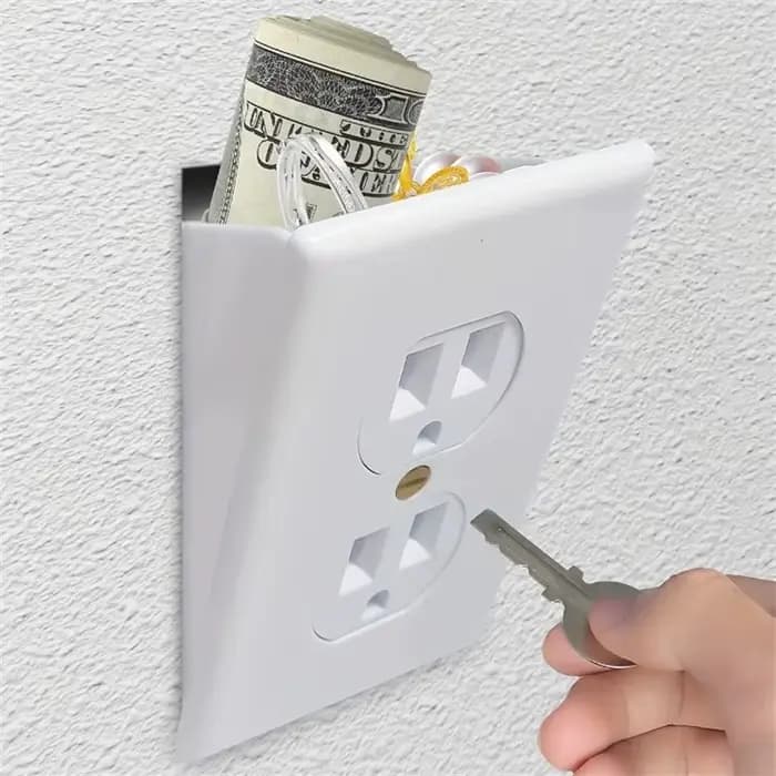 Boîte de rangement de prise murale cachée créative