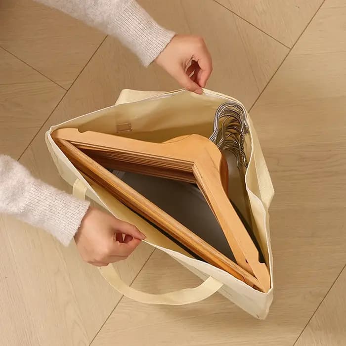 Sac de rangement triangulaire pour cintres