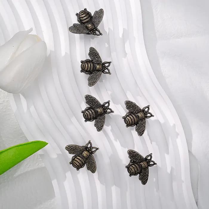 Paquet de 6 poignées en métal rétro pour tiroir d'armoire à bijoux en forme d'abeille