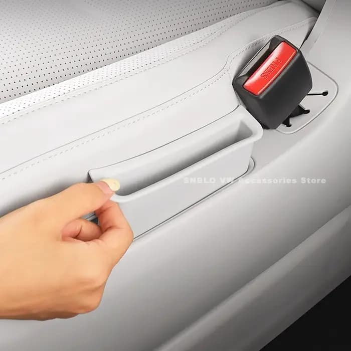 Boîte de rangement pour téléphone latéral du siège de la deuxième rangée