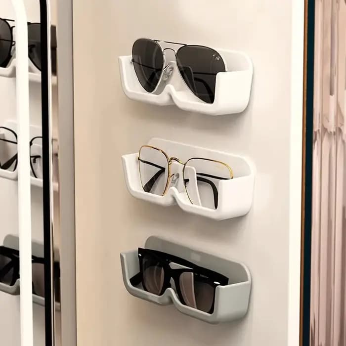 Vitrine murale perforée pour lunettes de soleil