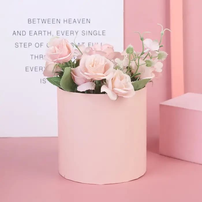 Boîtes rondes en papier à fleurs