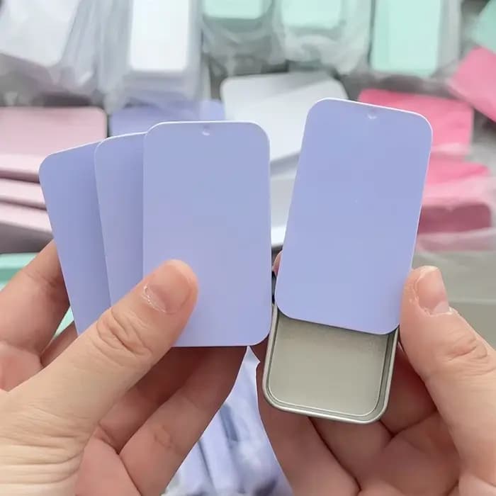 Petite boîte en fer à couvercle coulissant couleur Macaron