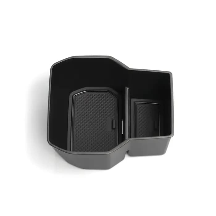 Boîte de rangement pour accoudoir de console centrale