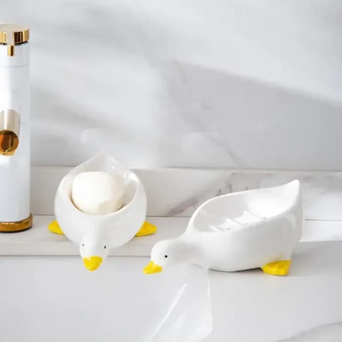 Boîte à savon en forme de canard jaune