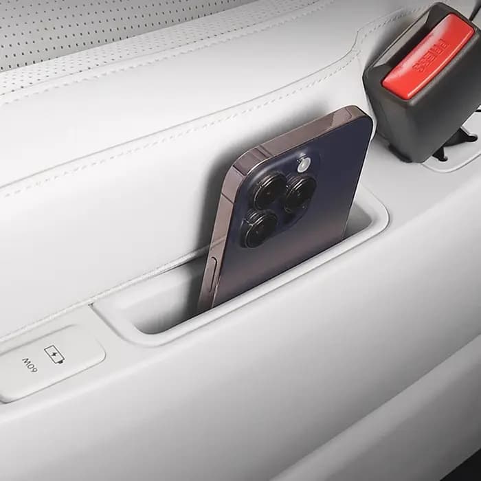 Boîte de rangement pour téléphone latéral du siège de la deuxième rangée