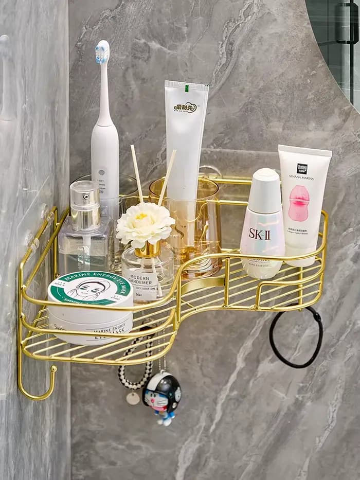 Étagère de rangement triangulaire dorée pour salle de bain