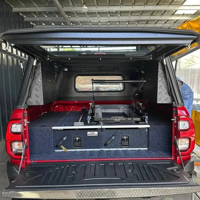 Système de rangement pour coffre de voiture