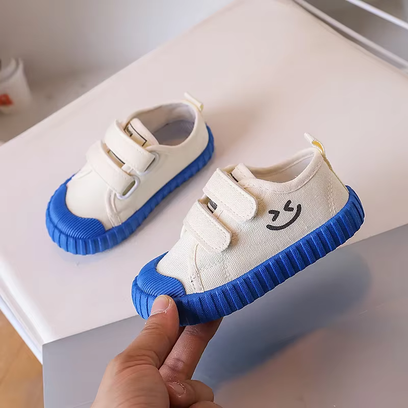 Chaussures en toile pour enfants Version coréenne visage souriant chaussures décontractées printemps