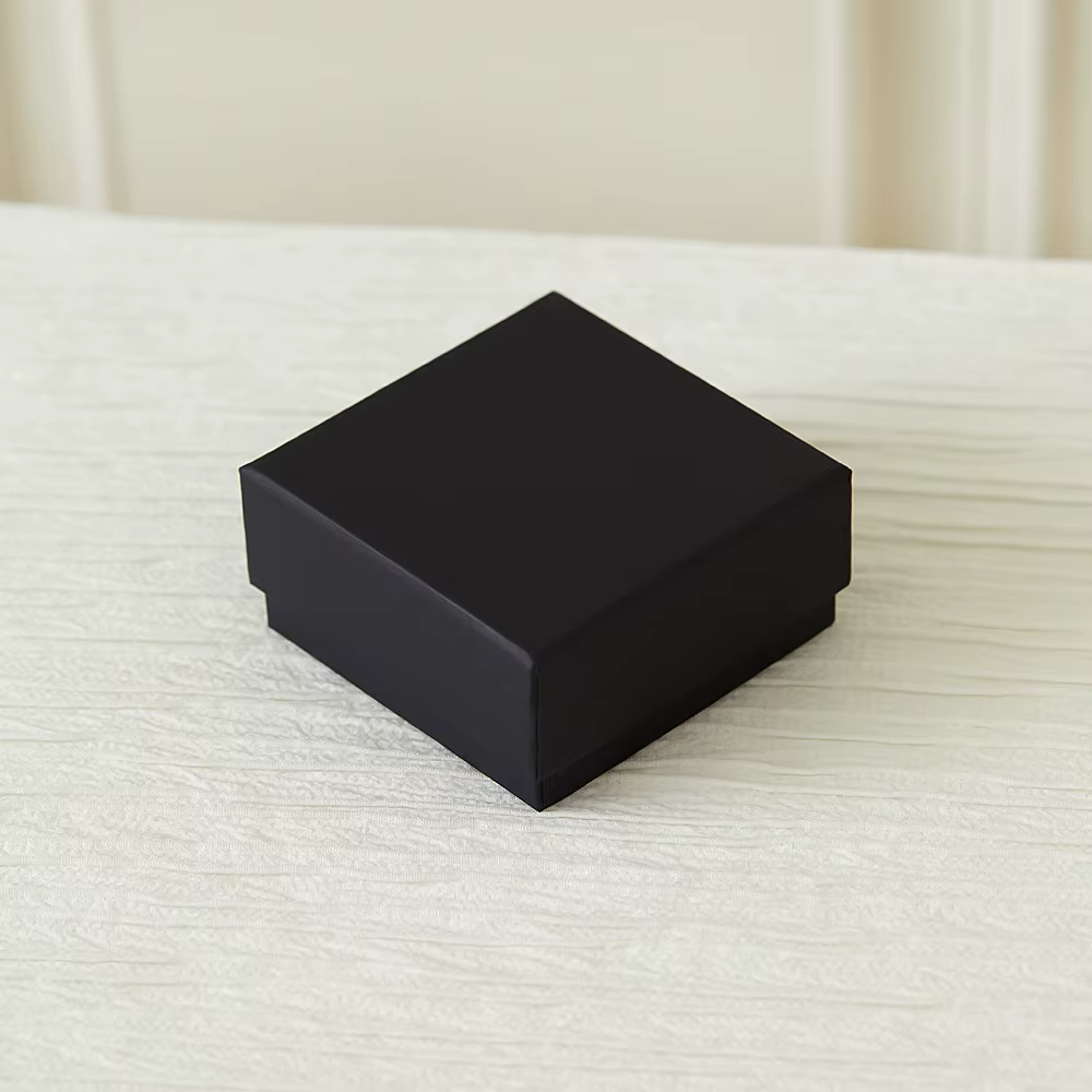 Paquet de 32 boîtes à bijoux en papier kraft noir 7x7x2,5 cm pour bagues et colliers