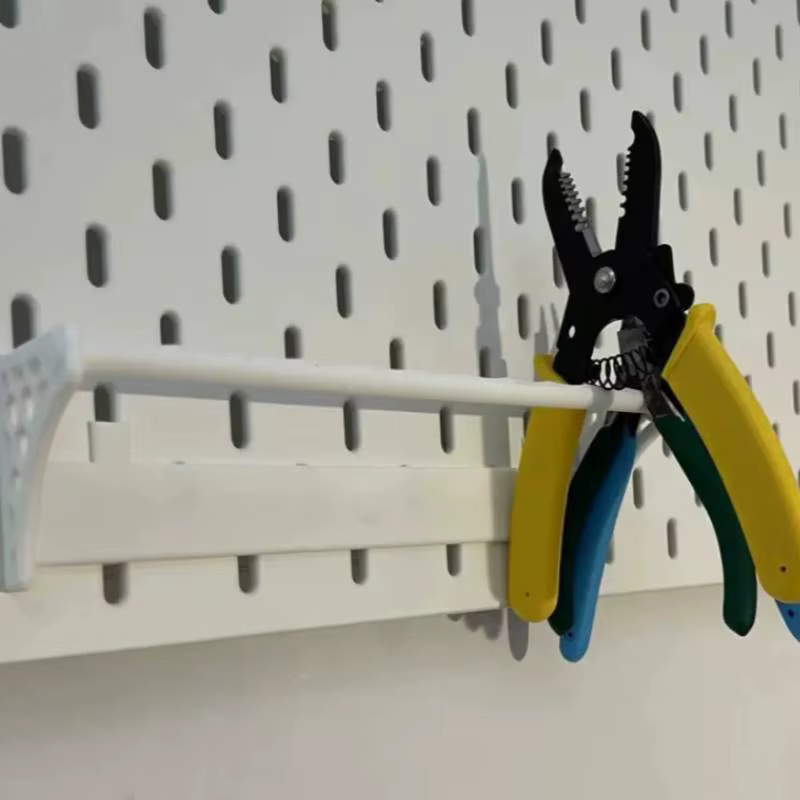 Support de rangement pour outils ménagers