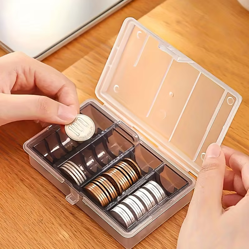 Boîte de rangement de pièces de monnaie multifonctionnelle